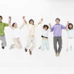 People-Holding-Hands-Jumping